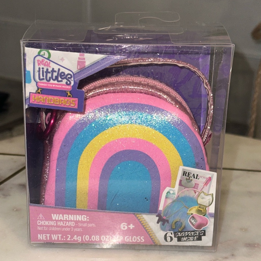 NIB REAL LITTLES Collectible Micro Handbag w/ 6 Beauty Surprises Inside Rainbow